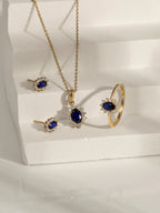 Oval Cut Created Sapphire With Lab Grown Diamond Accent Halo Pendant Necklace
