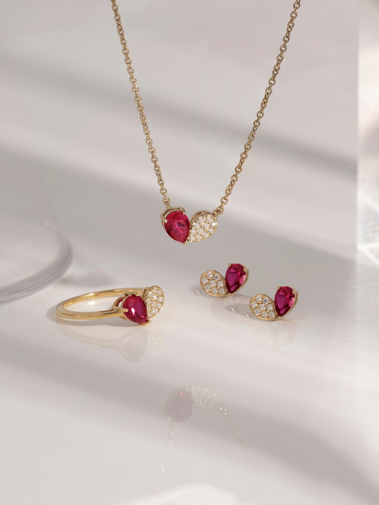 Pear Cut Created Ruby And Pave Lab Grown Diamond Heart Shaped Stud Earrings