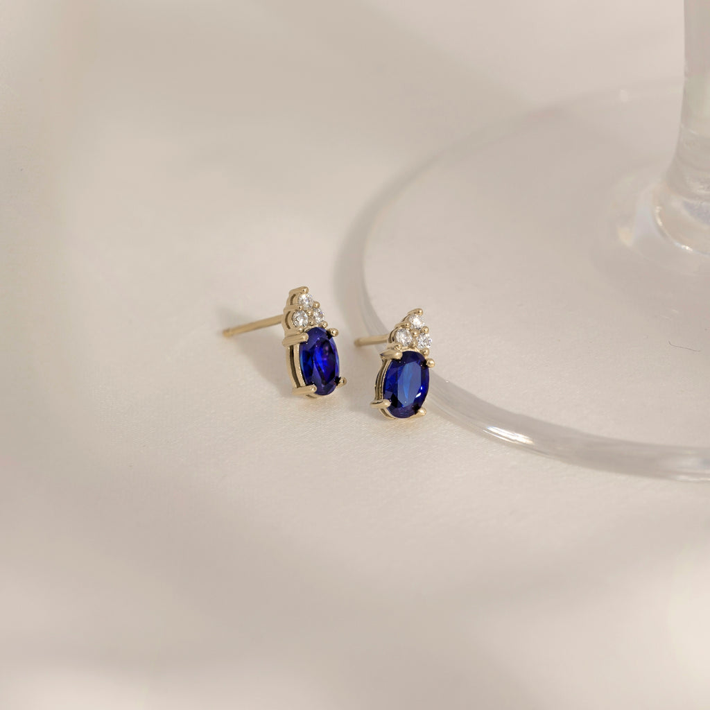 Oval Cut Sapphire With Trio Lab Grown Diamond Stud Earrings