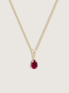Pear Cut Created Ruby With Lab Grown Diamond Accent Pendant Necklace