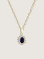 Oval Cut Created Sapphire With Lab Grown Diamond Accent Halo Pendant Necklace