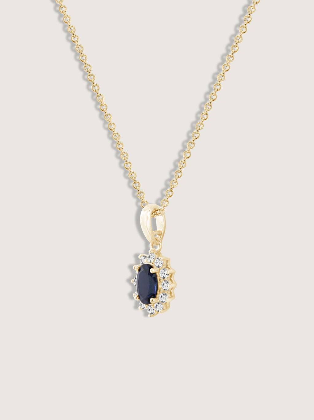 Oval Cut Created Sapphire With Lab Grown Diamond Accent Halo Pendant Necklace