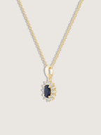 Oval Cut Created Sapphire With Lab Grown Diamond Accent Halo Pendant Necklace