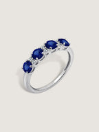 4mm Round Cut Created Sapphire With Lab Grown Diamond Accent Half Band Ring
