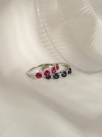 4mm Round Cut Created Sapphire With Lab Grown Diamond Accent Half Band Ring