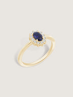 Oval Cut Created Sapphire With Lab Grown Diamond Accent Halo Ring