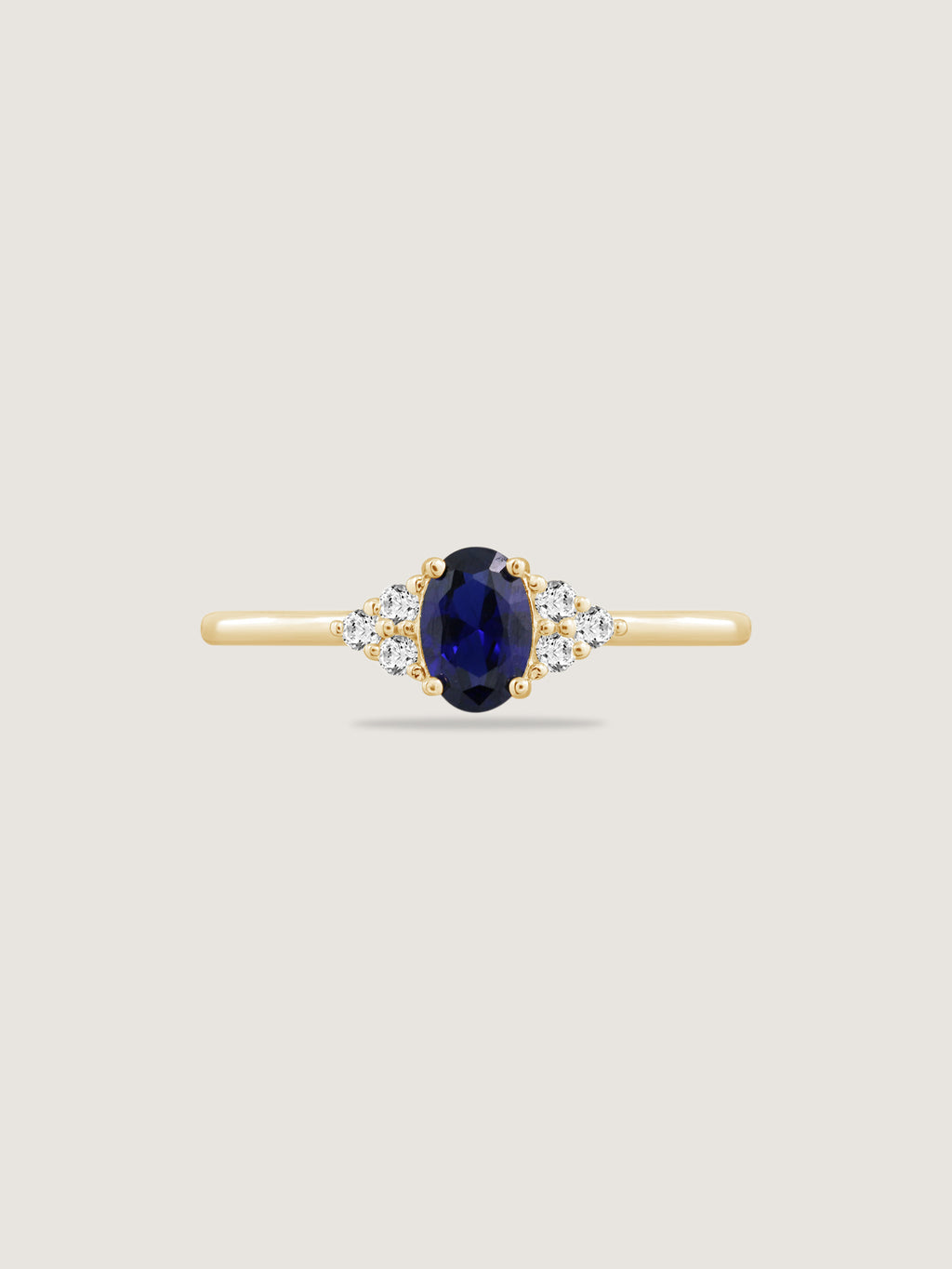 Oval Cut Created Sapphire With Trio Lab Grown Diamond On Shank Engagement Ring
