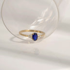 Oval Cut Sapphire With Trio Lab Grown Diamond On Shank Engagement Ring