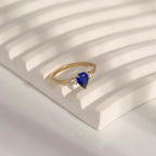 Pear Cut Sapphire With Lab Grown Diamond Three Stones Ring