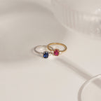 Oval Cut Created Ruby And Lab Grown Diamond Three Stones Ring