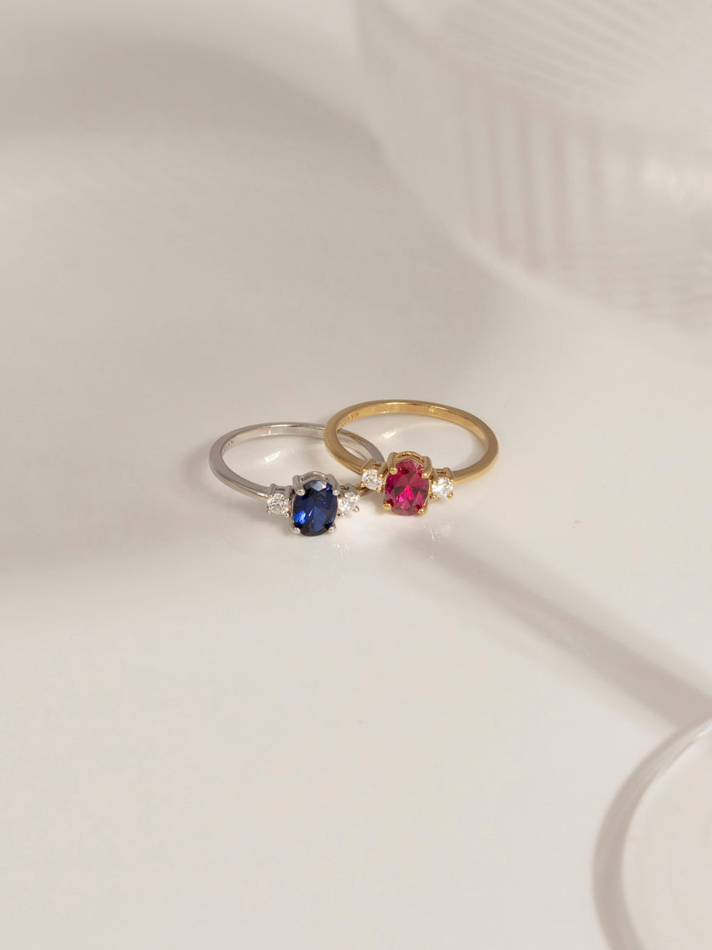 Oval Cut Created Sapphire And Lab Grown Diamond Three Stones Ring