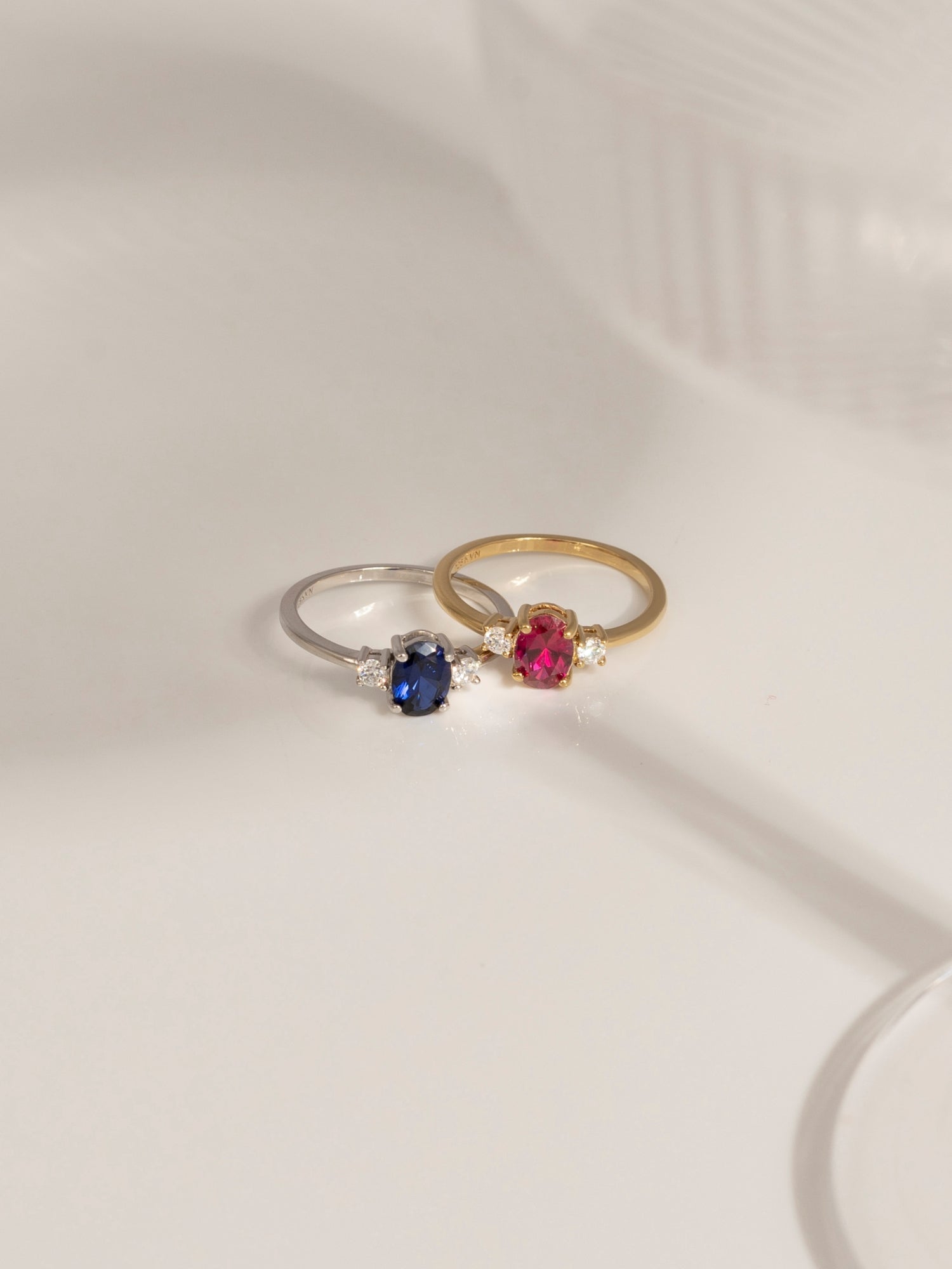 Oval Cut Created Sapphire And Lab Grown Diamond Three Stones Ring